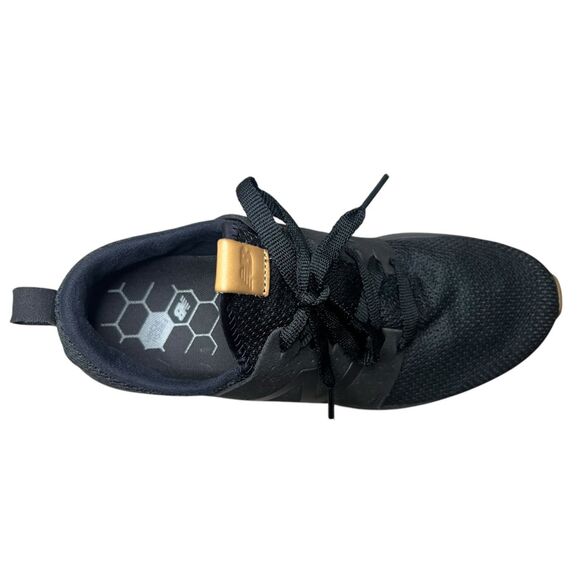 New Balance Black Athletic Shoes with Breathable Mesh and Minimalist Design - Picture 8 of 9